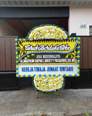 Papan Bunga Duka di Pintu Rime Gayo